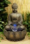 Beleuchteter Buddha-Brunnen mit...